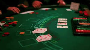 jltttt live casino dealer table with cards and chips for Filipino players